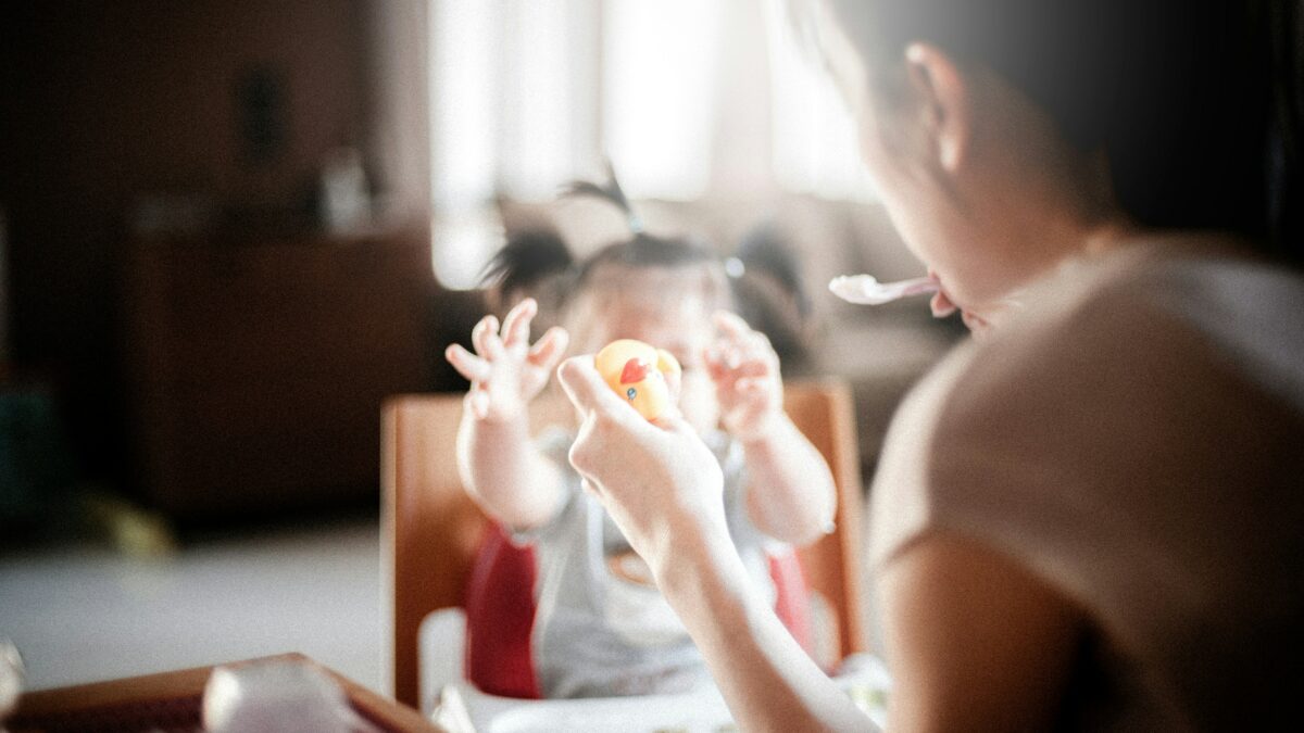 mother playing with child