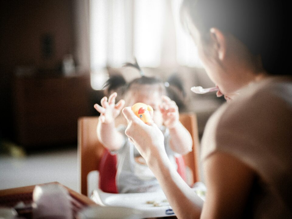 mother playing with child